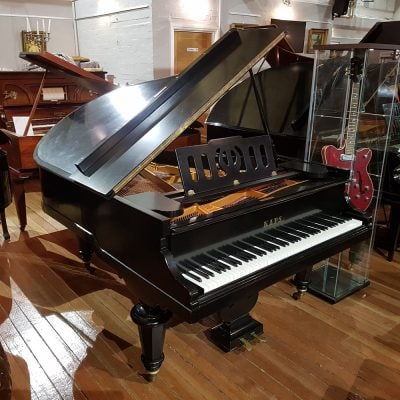 Used Ernst Kaps baby grand piano, in a black lacquer case for sale.