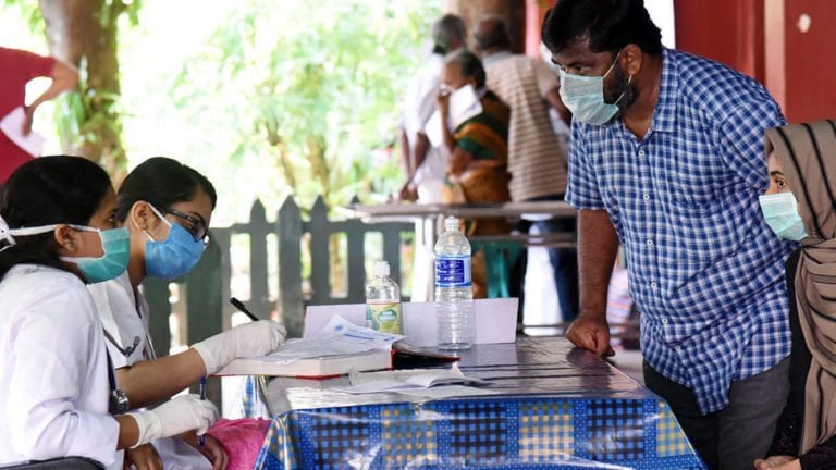 Hands together against Covid 19; A Kerala Model Hands together against Covid 19; A Kerala Model