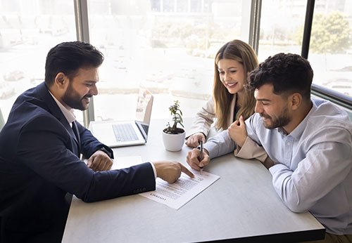 Professional reviewing legal prenuptial contract with family lawyer