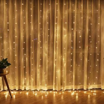 6: Twinkle Star 300 LED Window Curtain String Light