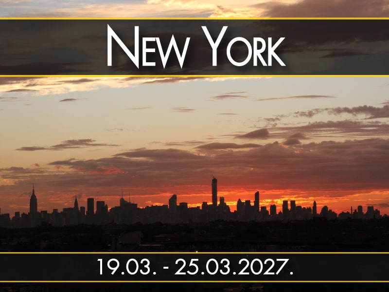 New York, polazak 19.03. - 25.03.2027.: Silueta Menhetna u zalazak sunca, narandžasto nebo, večernje