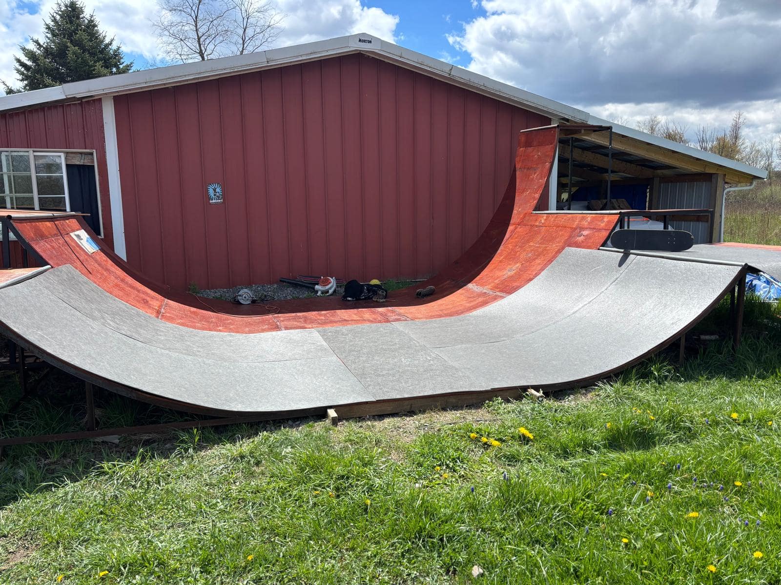 Skateboarding ramp made with smooth and impact-resistant recycled plastic wood