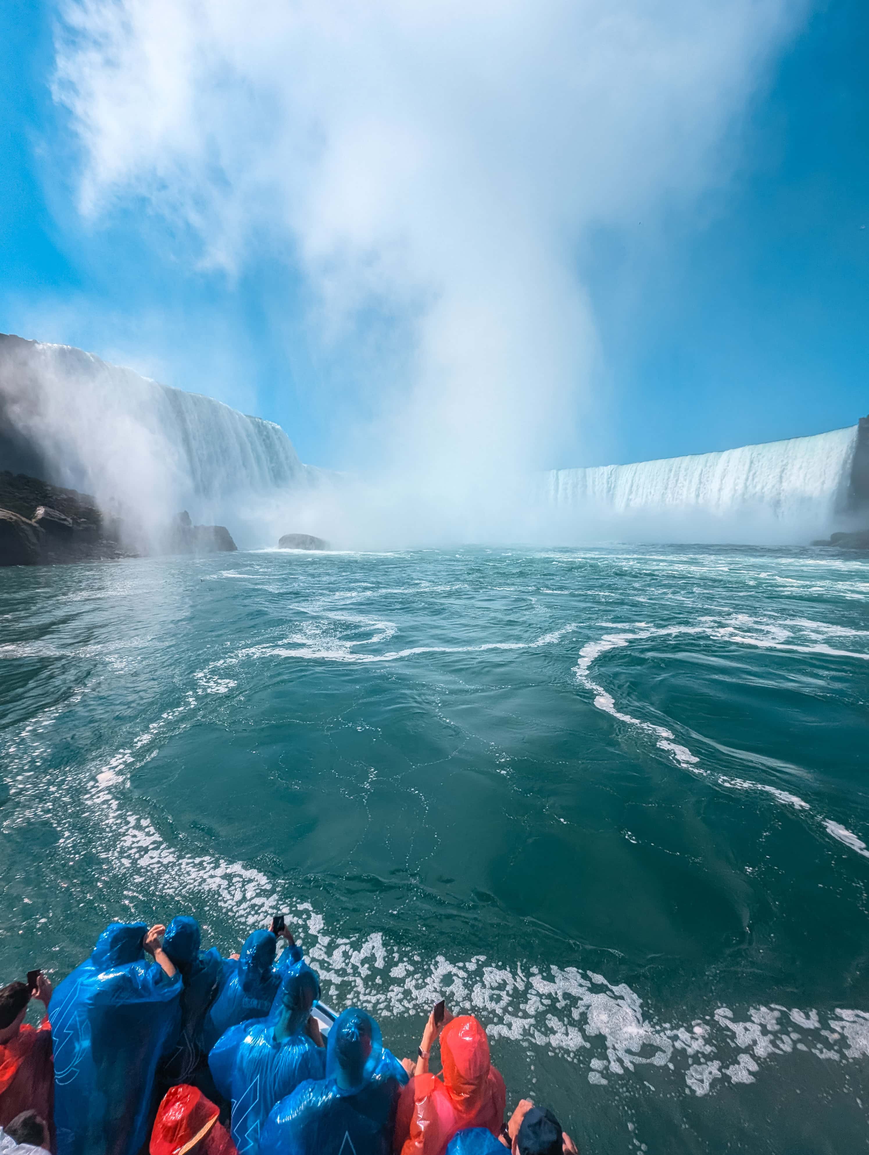 Boat approaching Horseshoe Falls during a Maid of the Mist ride, a must-do experience in Niagara Falls with kids