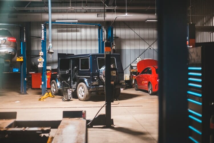 Car at the mechanic with costs covered by car repair loans