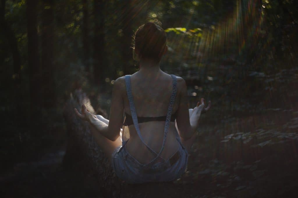 woman practicing meditation