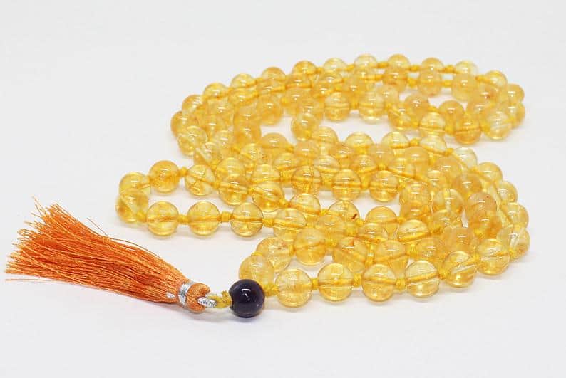 yellow mala beads