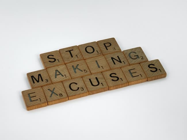 stop making excuses sign