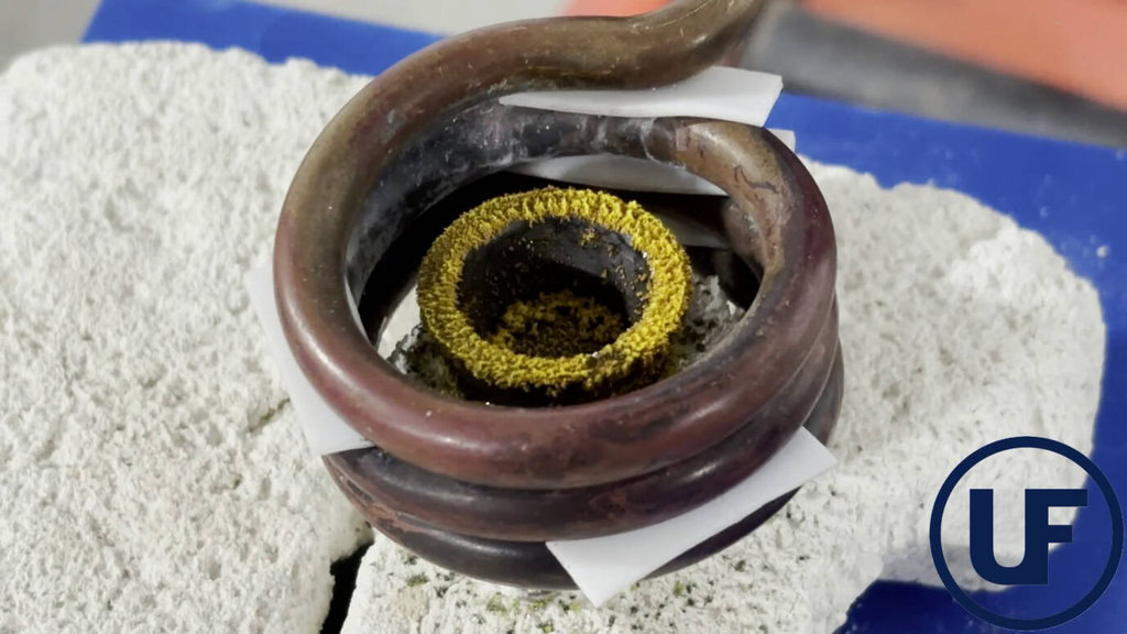 High-Temperature Induction Heating of Rock Powder