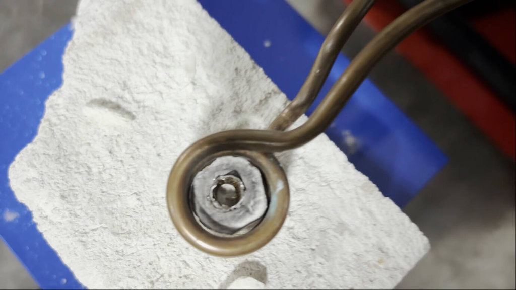 High-Temperature Induction Heating of Rock Powder