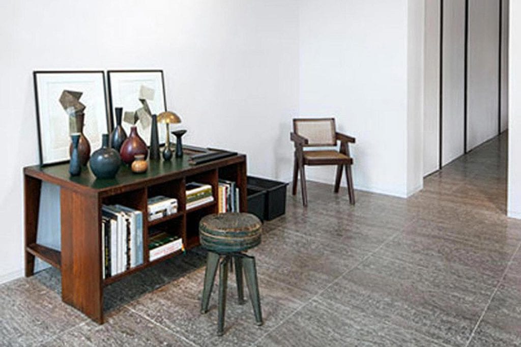 Oliver Jungel has stylishly combined Pierre  Jeanneret seating, fine ceramics and industrial chic 