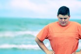 Man Deciding How to Lose Weight Quick