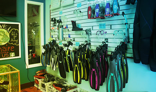 Dolphin Dive Center shop rack scuba equipment