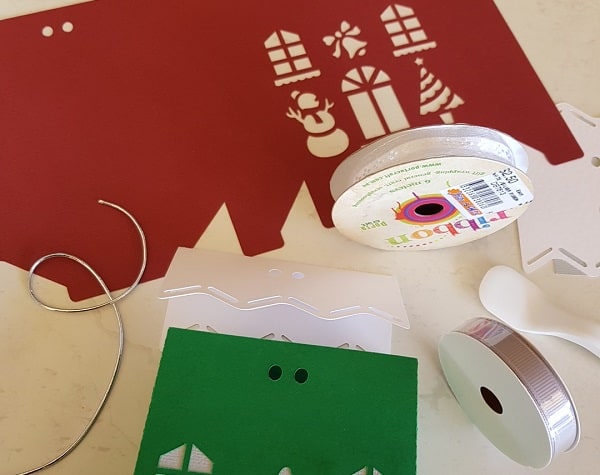 Choices of ribbons for tying the Christmas gift box roof on.