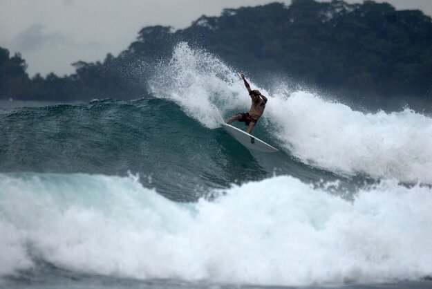Coach Erik Krammer earning his street cred on a set wave.