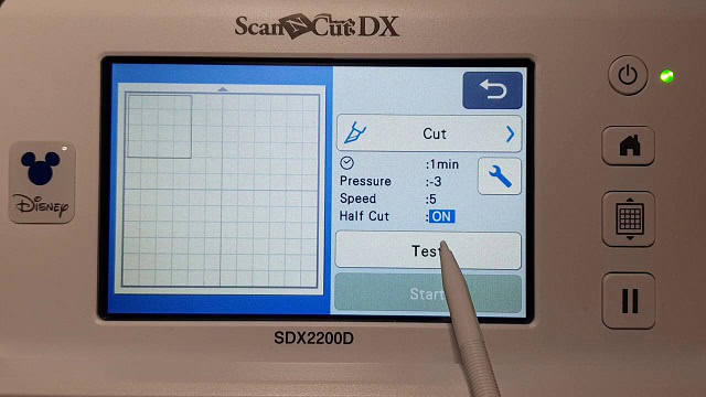 Test cut button on the DX model Scan N Cut