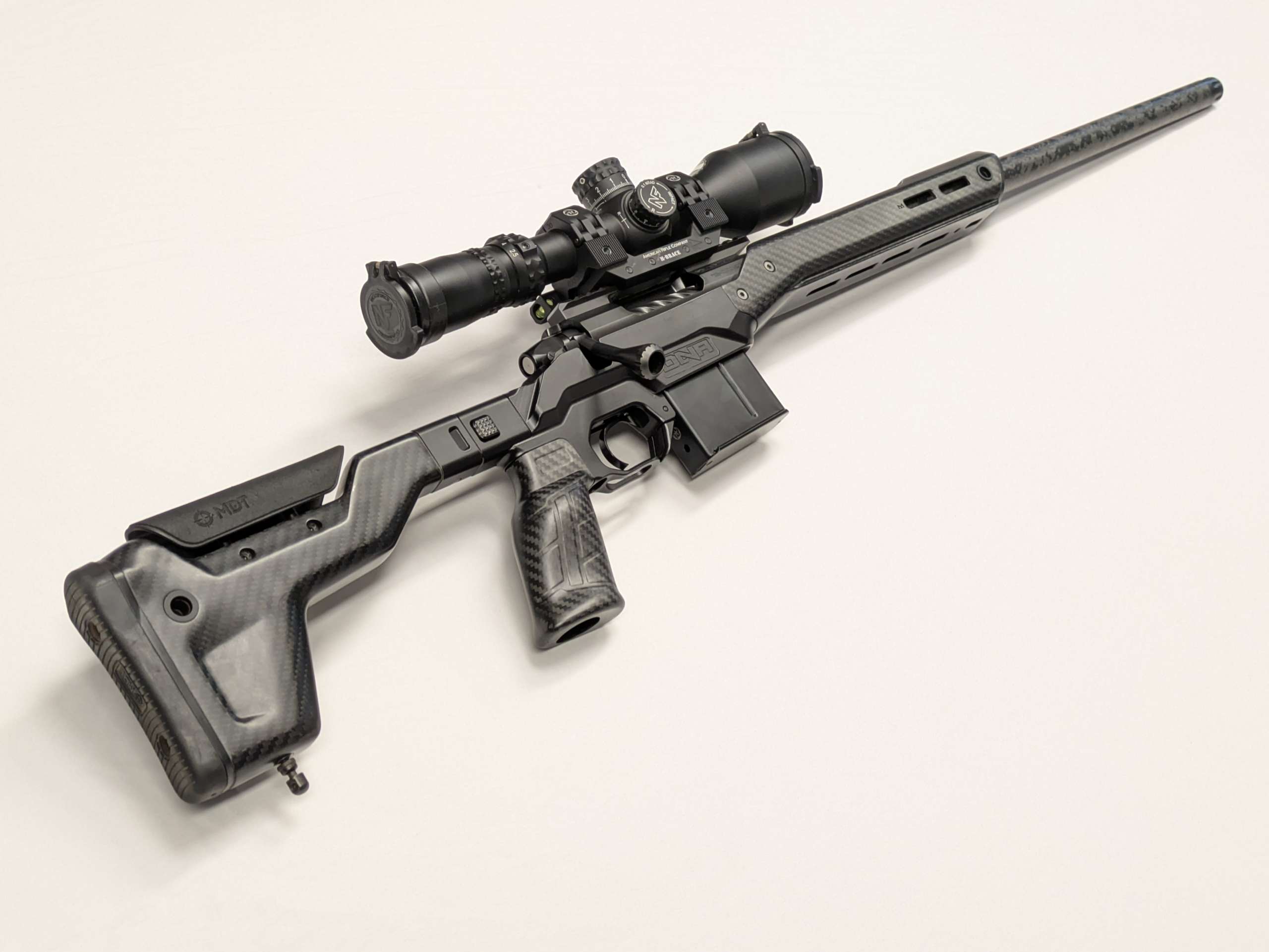 Nightforce NX8 2.5-20x50mm, Black, Mil-C Riflescope with American Rifle Company M-Brace Scope Mount - Image 4