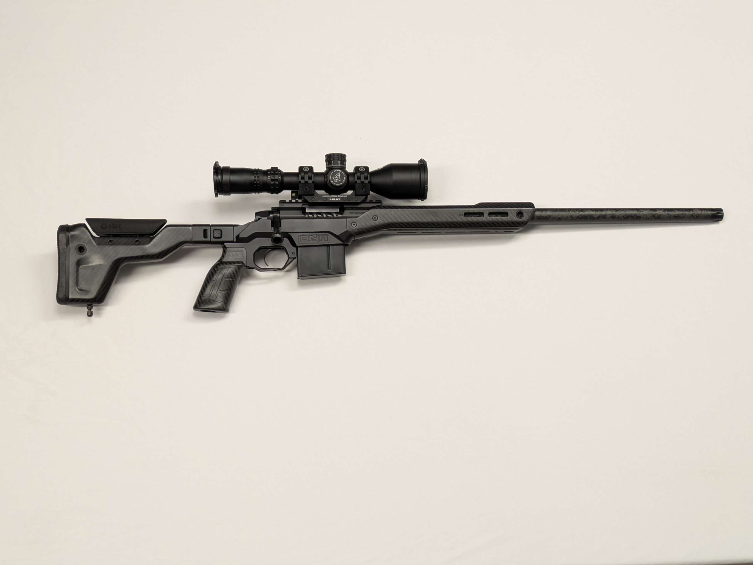 Nightforce NX8 2.5-20x50mm, Black, Mil-C Riflescope with American Rifle Company M-Brace Scope Mount - Image 2