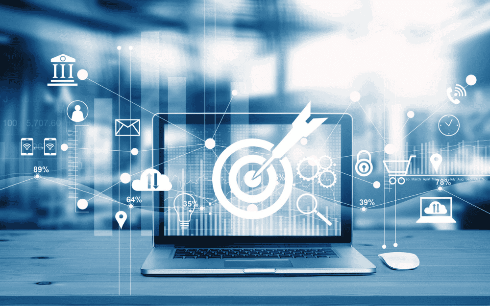 An open laptop showing a graphic of a bullseye, surrounded by graphics related to email, health, location, shopping, and security