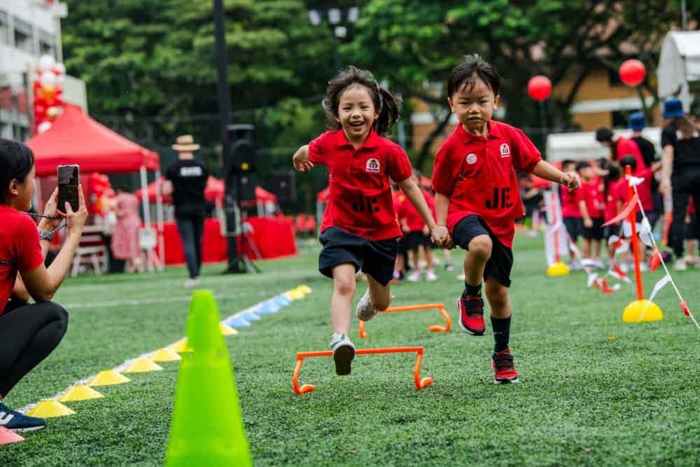 two children running to the finish line