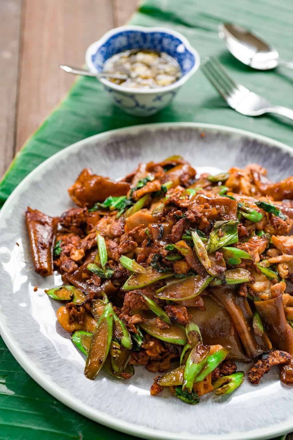 Pad See Ew Recipe Pad See Ew is a delightful stir-fry with broad rice noodles, chicken, egg and greens seasoned with sweet soy sauce.
