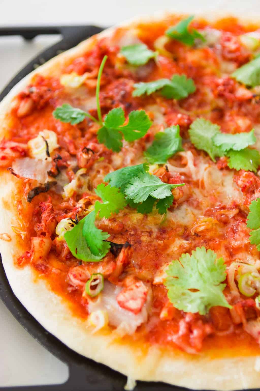 Kimchi Pork Belly Pizza Recipe Scrumptious kimchi pork belly pizza with gruyere cheese and a spicy gochujang sauce.
