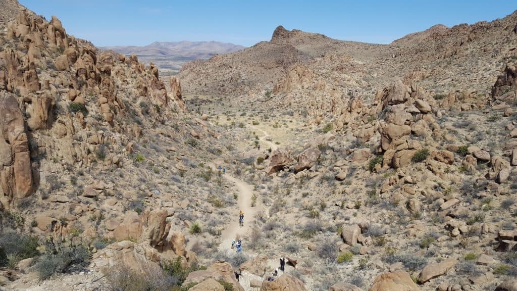 family hiking to balanced rock