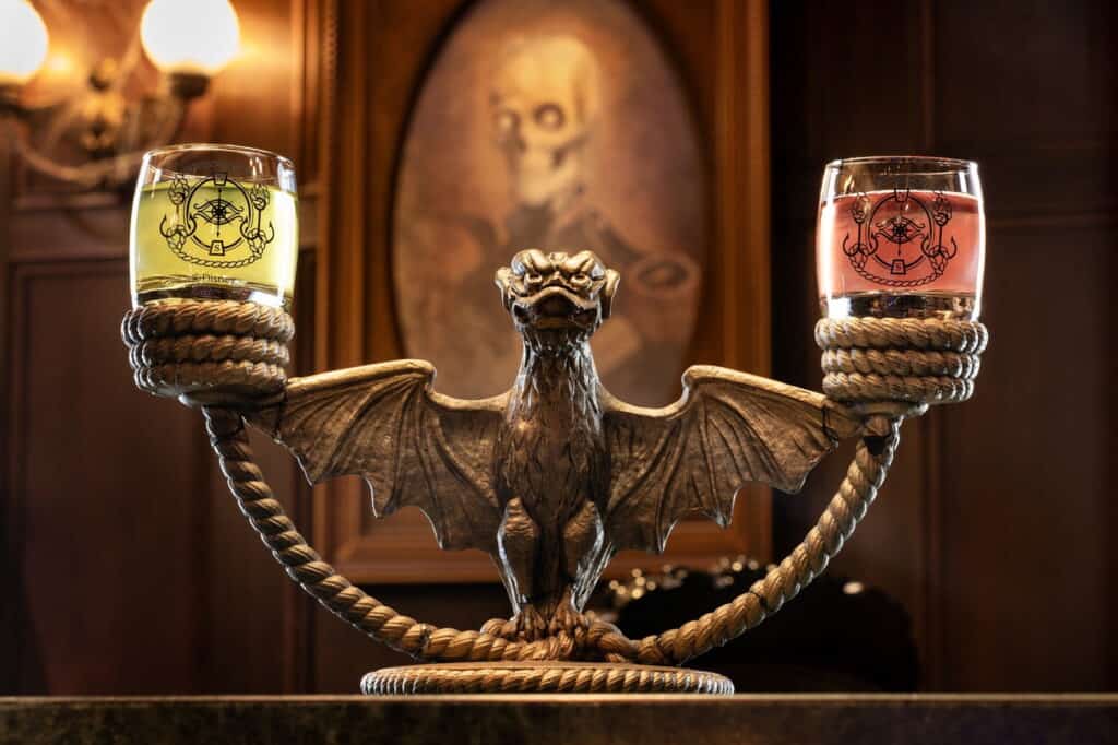 Aboard the Disney Treasure, the Haunted Mansion Parlor honors more than five decades of fandom and introduces the world to the next chapter of the Haunted Mansion saga. Guests will enjoy spooktacular, specialty cocktails themed to the classic Disney Parks attraction and its inhabitants, as well as a variety of Haunted Mansion details from around the world. (Kent Phillips, photographer)