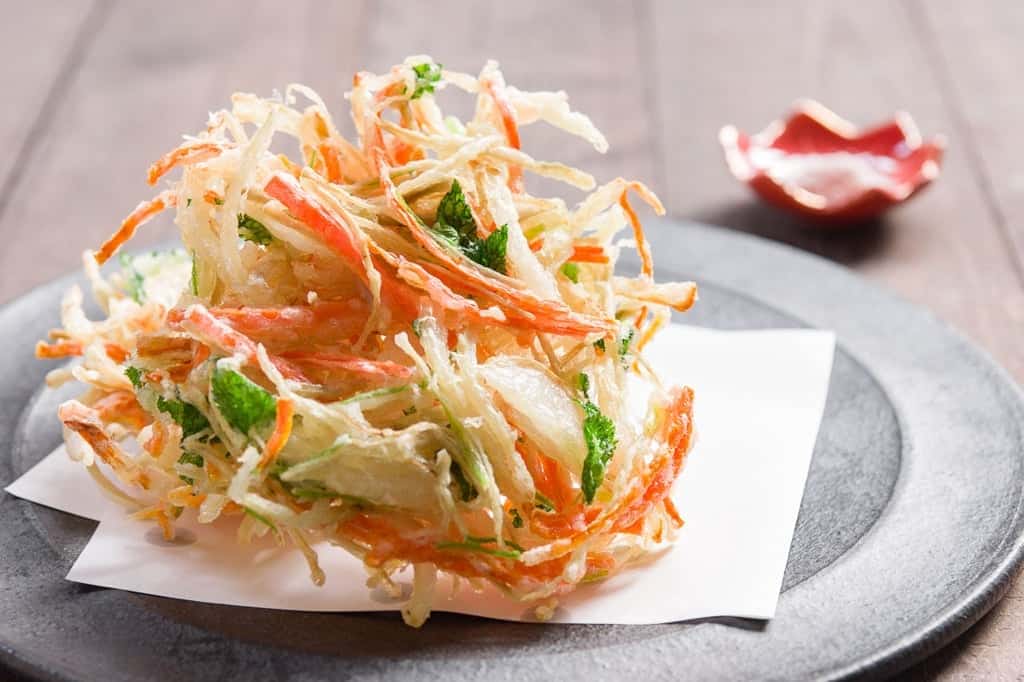 Kakiage (Vegetable Fritter) Recipe Japanese kakiage fritters are a type of tempura made with vegetables such as budock, onions, and onions.