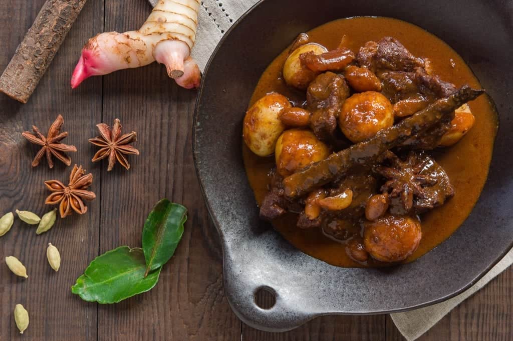 Massaman Beef Curry Recipe Savory, spicy, sweet and tangy Massaman curry is a Thai dish with Persian roots. With tender chunks of beef, potatoes and peanuts, this curry is both flavorful and aromatic.