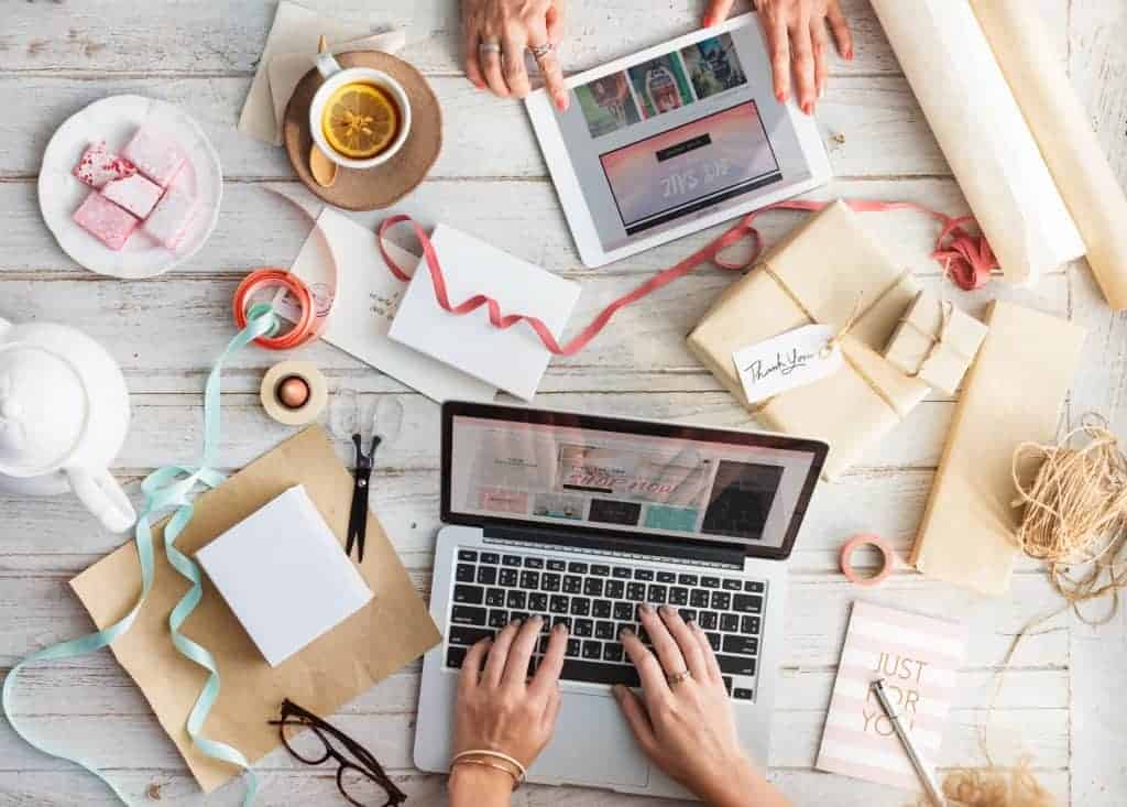 small business shipping laptops and shipping supplies laid out