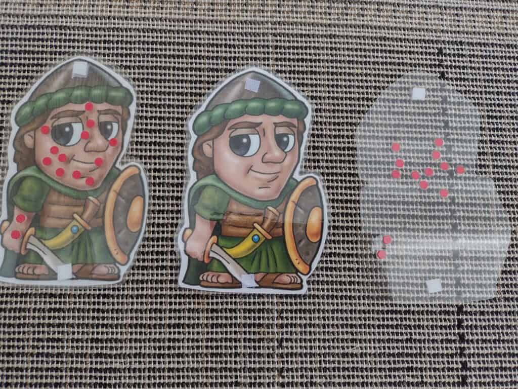 Picture of Naaman craft for preschoolers and toddlers. One with leprosy on and one with leprosy to the side