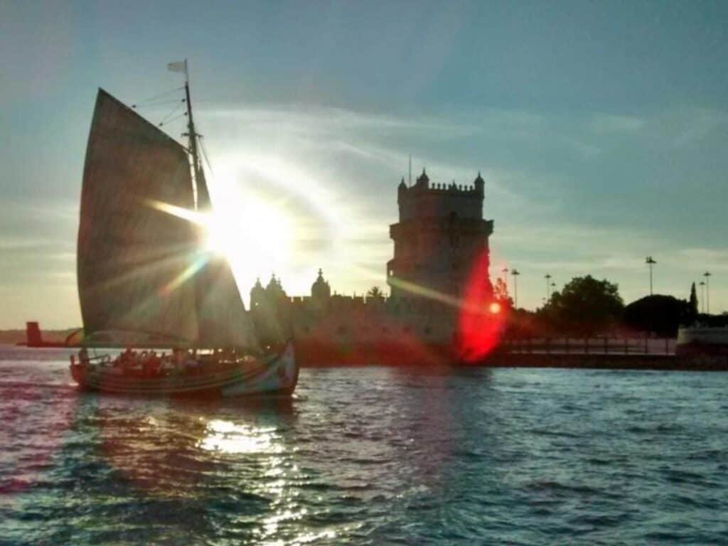 Incredible traditional vessel passing the Belem Tower during the Lisbon river cruise