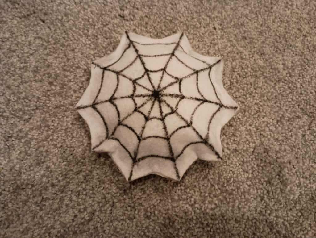 Picture of spiderweb shaped felt toys