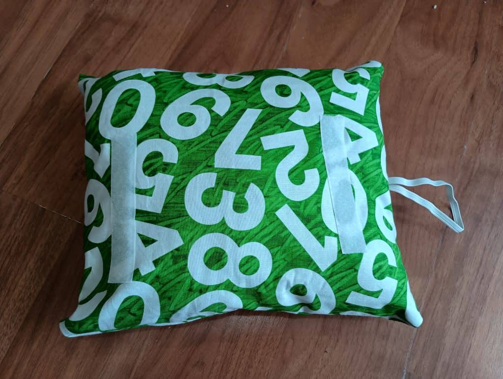 Picture of two Velcro strips on a pillow