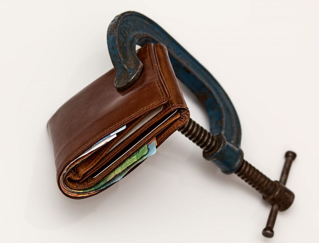 Photo of wallet in clamp insolvency solicitor Leicester