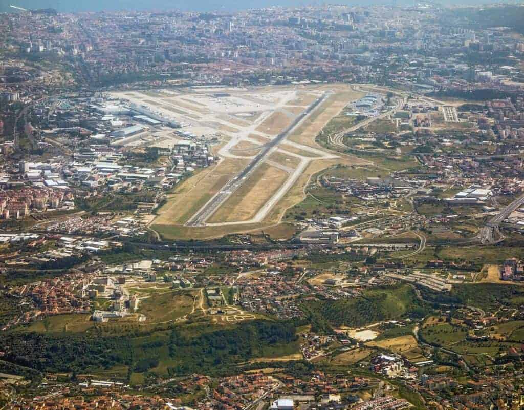Lisbon International Airport as seen from above. Lisbon Airport wait times are notoriously long because of passport control so make sure to give yourself lots of time before boarding.