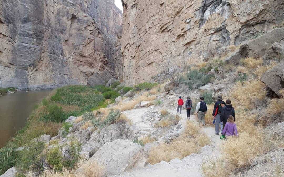 family hiking on one of big bend national park hiking trails