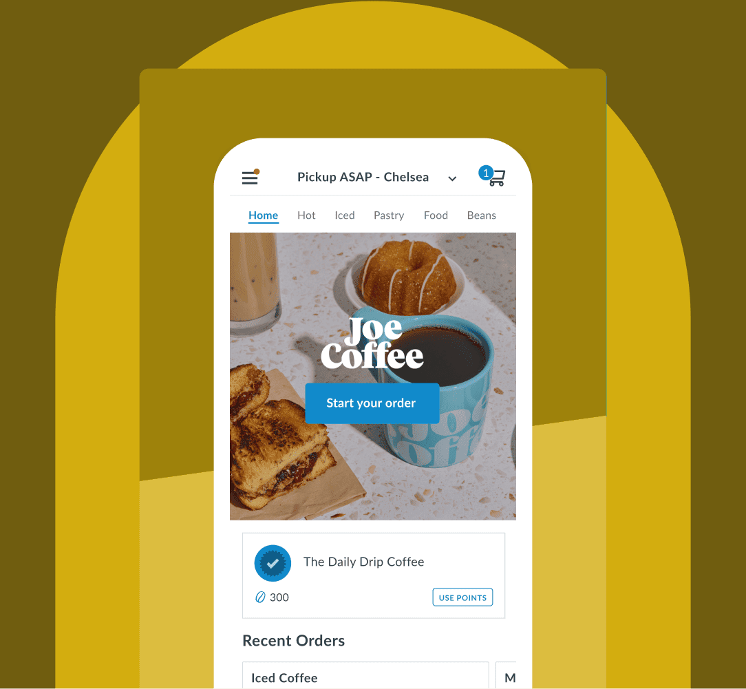 Mobile screen showing the Joe Coffee ordering interface with a cup of coffee, sandwich, and pastry. The screen includes navigation tabs like Hot, Iced, Pastry, Food, and Beans, and a button labeled “Start your order.”