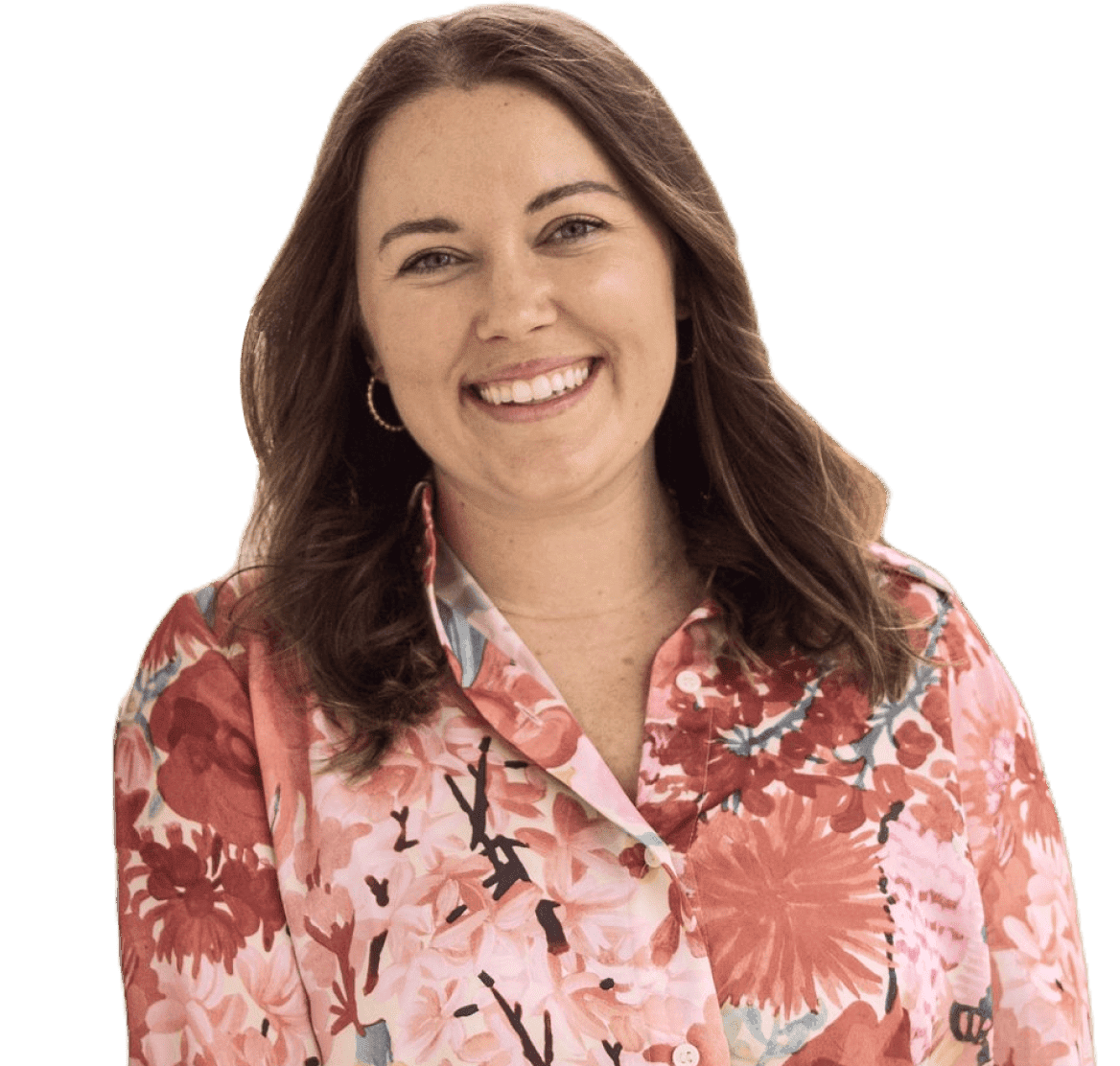 Smiling woman, Katie Love, VP of Marketing at Sonny’s BBQ, with wavy brown hair wearing a floral blouse, facing forward against a transparent background.