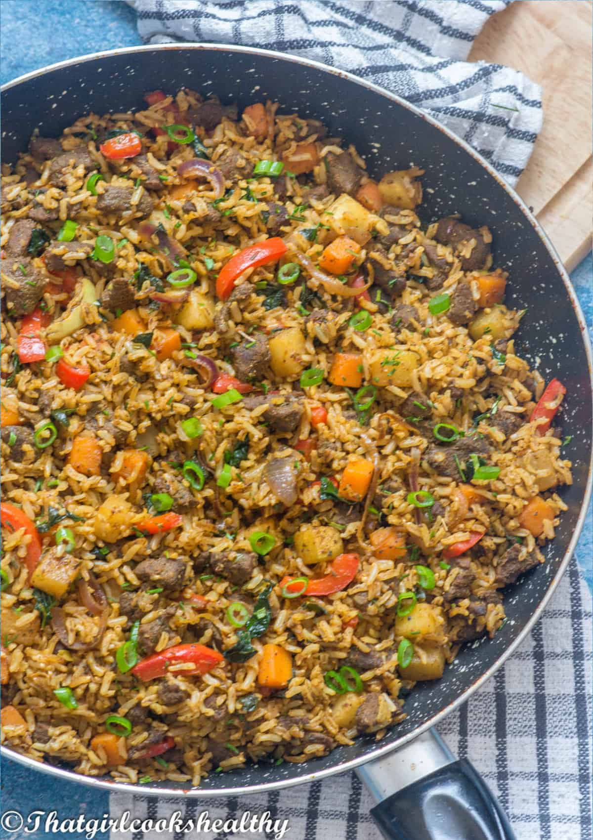 half a skillet with the lamb fried rice