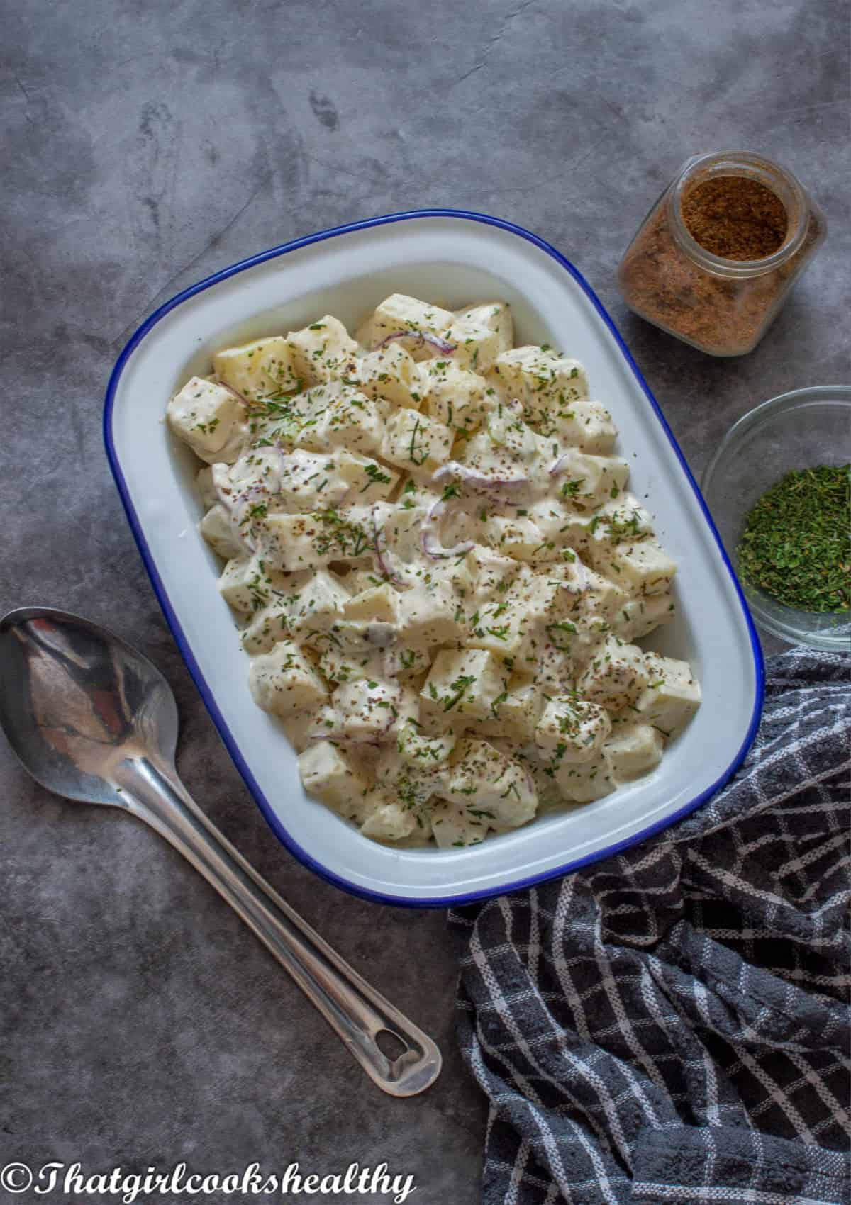 Potato salad in an enamel dish