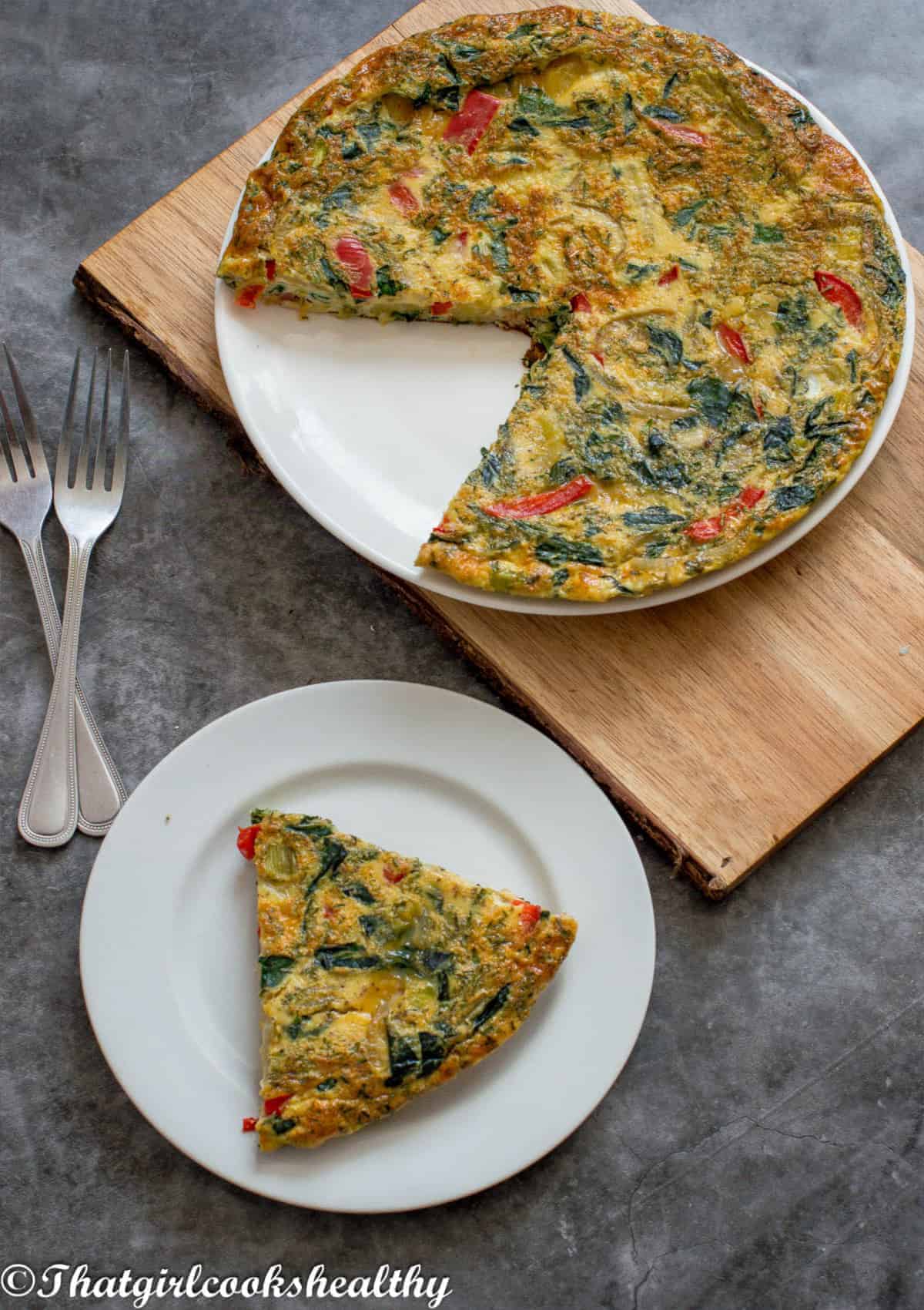 slice of omelette with omelette on the big plate