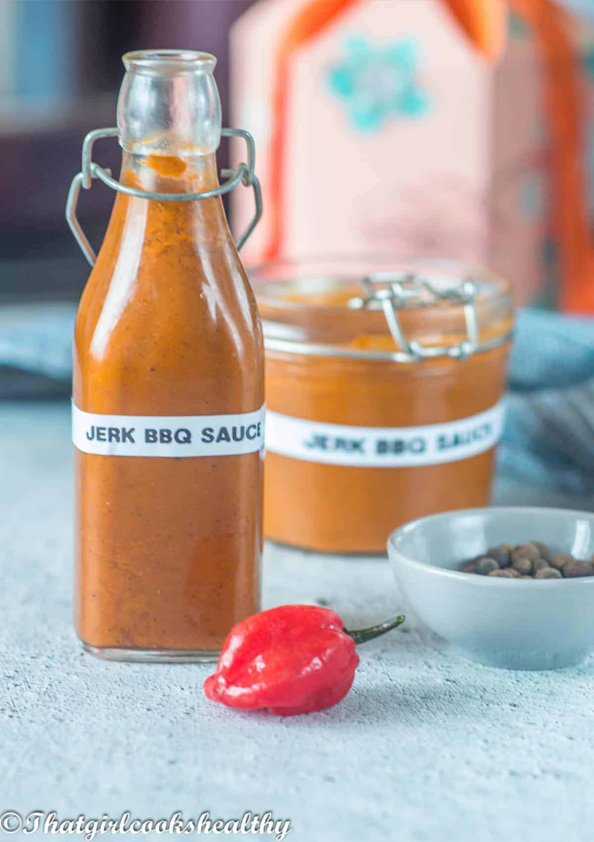 Labelled jerk sauce on a table