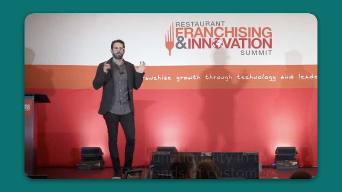 Screenshot from RFIS 2022 highlight reel featuring Zach Goldstein from Thanx