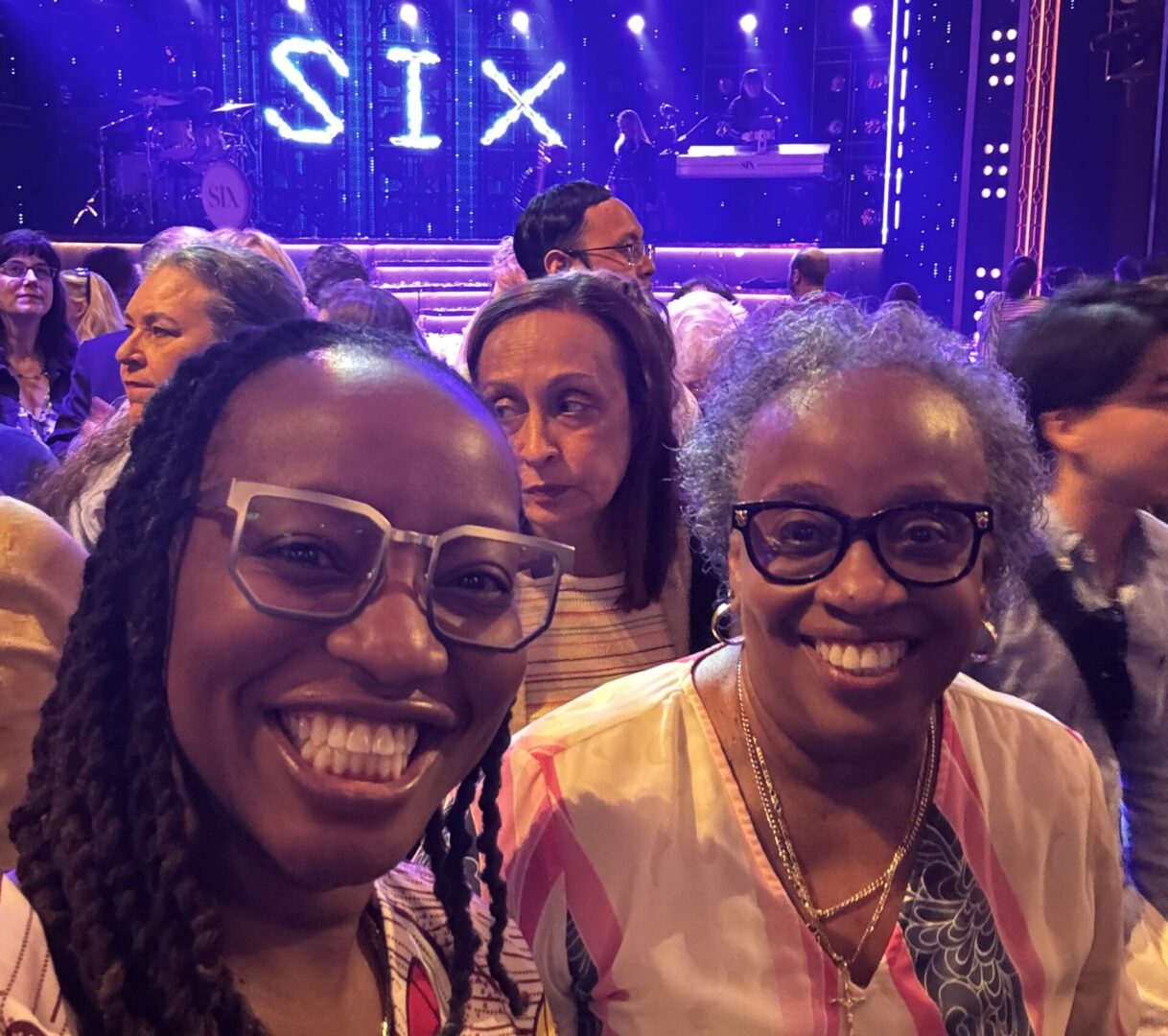 Dr. Nadine Duncan and her mother inside the Lena Horne Theatre after seeing SIX on Broadway in New York City