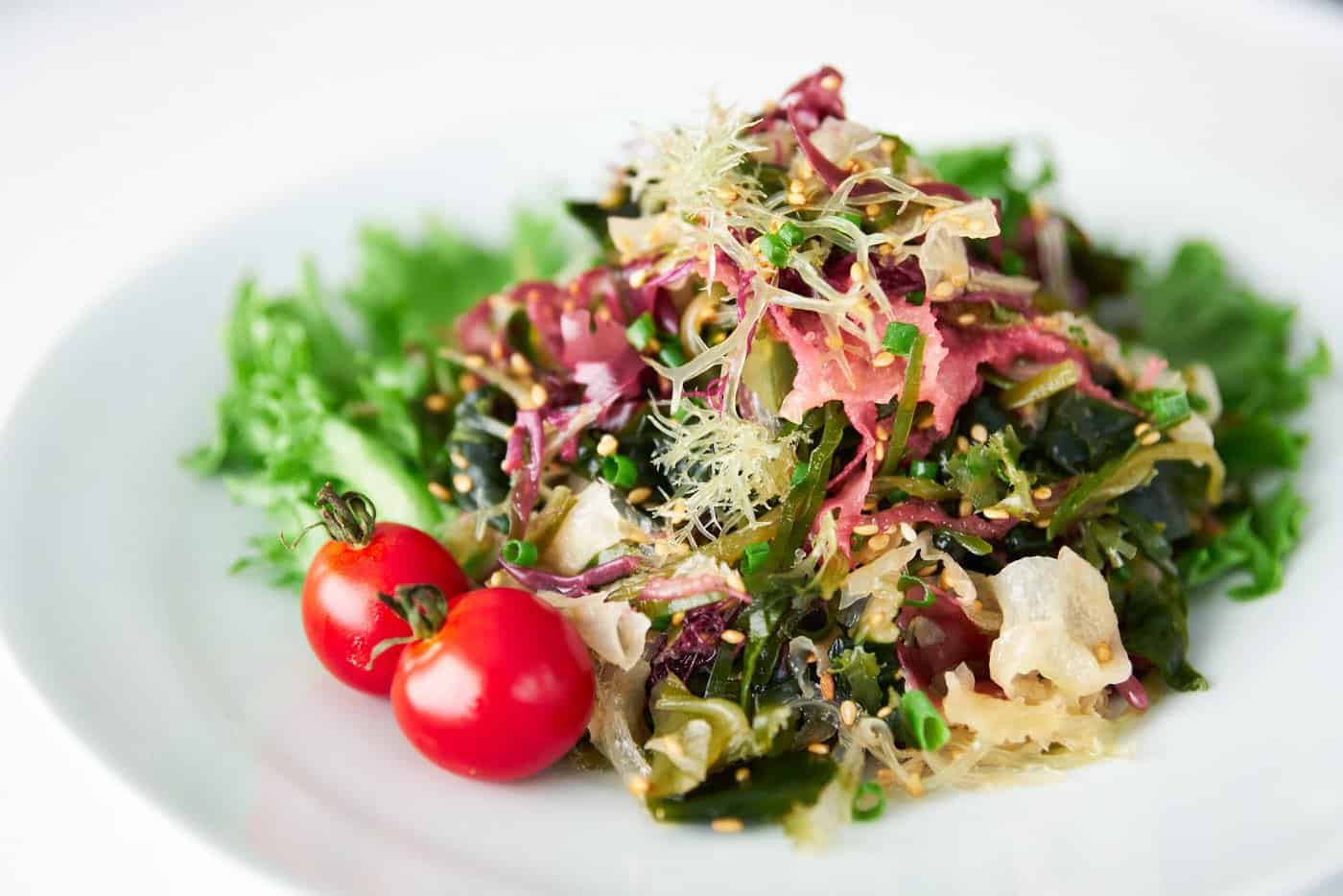 With a variety of seaweed tossed in a sesame ginger dressing, this seaweed salad is easy to make at home.