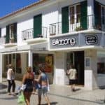 People walking on the pedestrian street in Ericeira.