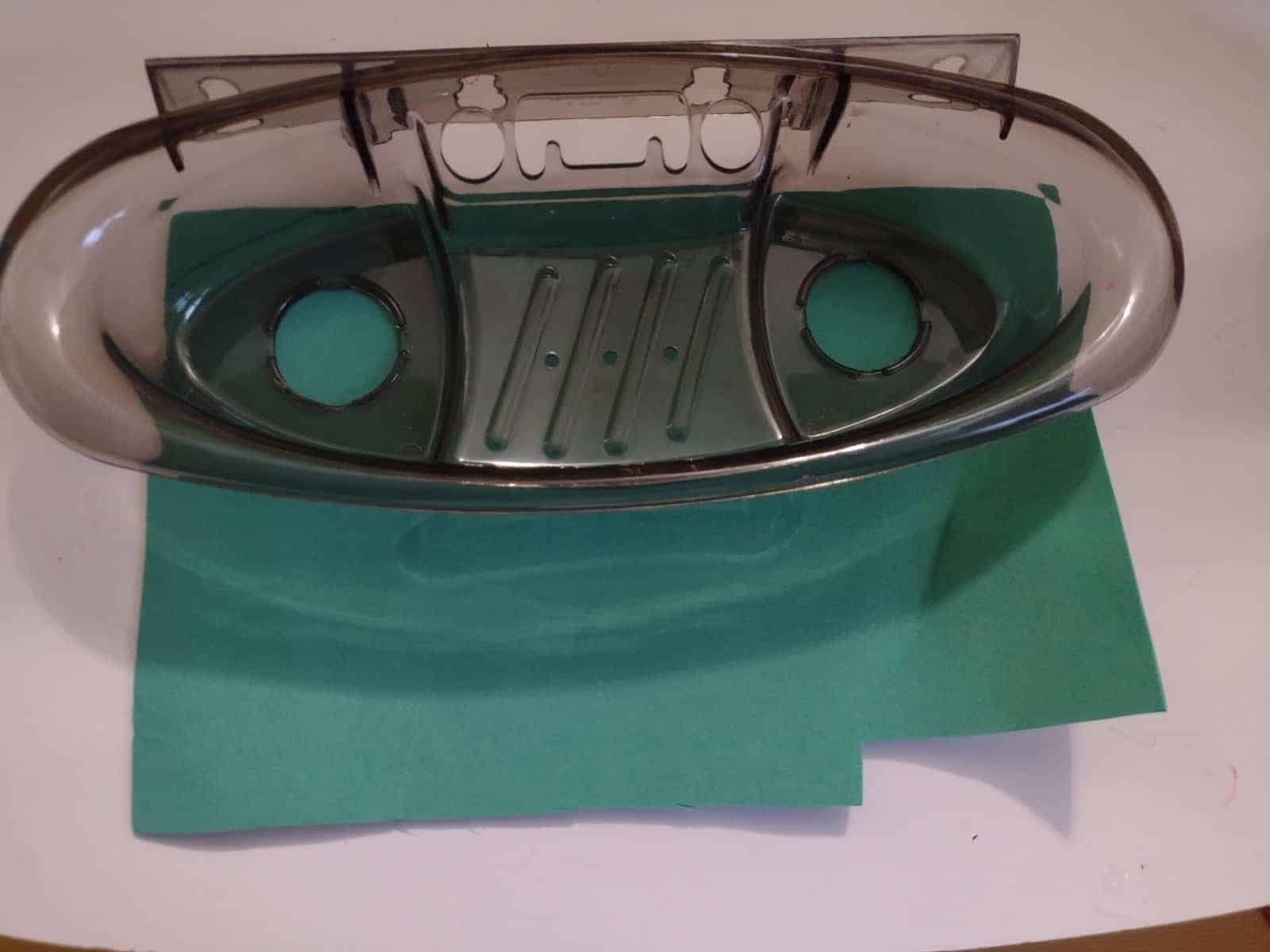 Picture of shower caddy on piece of foam