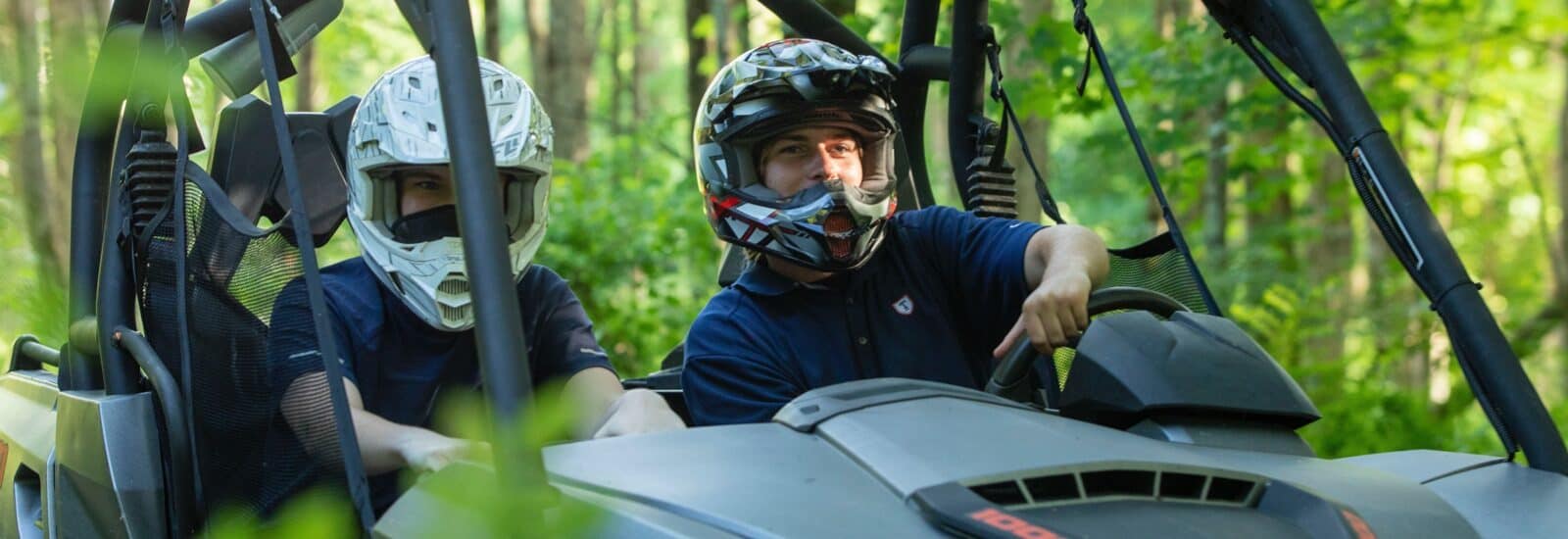 Teen boys driving ATV