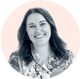 Portrait of Katie Love, VP of Marketing at Sonny’s BBQ. She is smiling, with long hair, wearing a floral shirt, shown inside a circular frame on a light pink background.